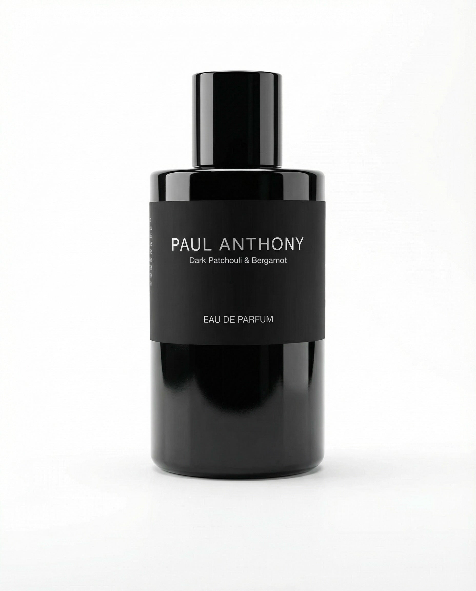 Black perfume bottle labeled 'Paul Anthony' on a white background