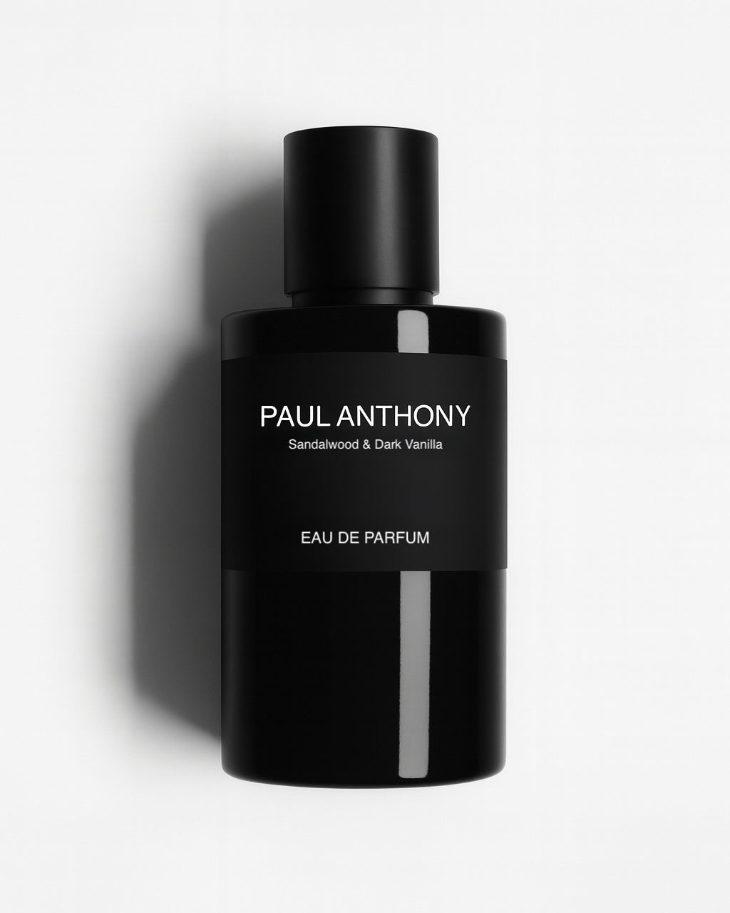 Sandalwood & Dark Vanilla, Black perfume bottle labeled 'Paul Anthony' on a white background, mens eau de parfum made in Australia