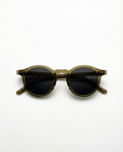 Round sunglasses with dark lenses and brown frame on a white background
